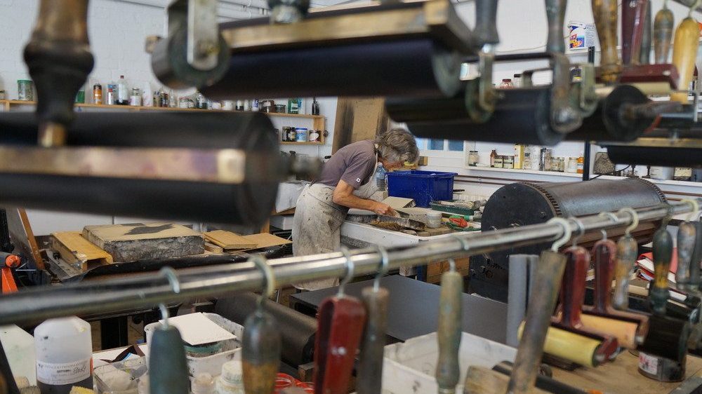 A student in the Printmaking workshop