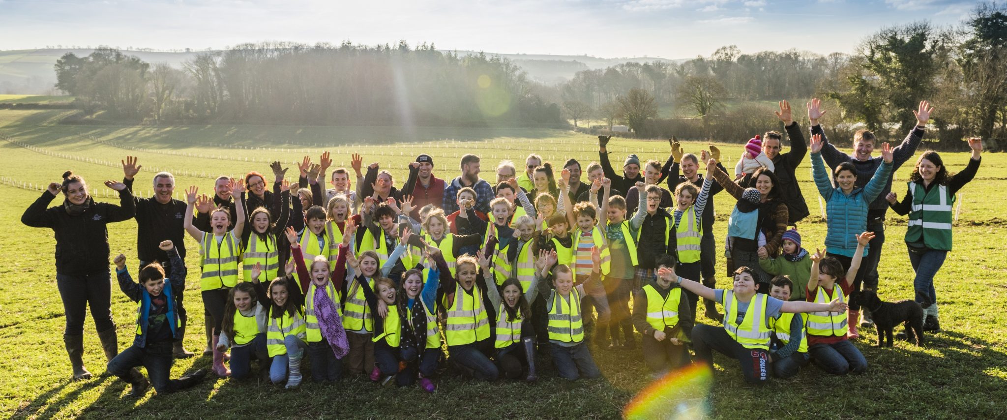 Local primary school helps Luscombe Drinks plant 1,600 trees at Dartington
