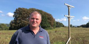 estate warden Mike Newby and a raptor perch