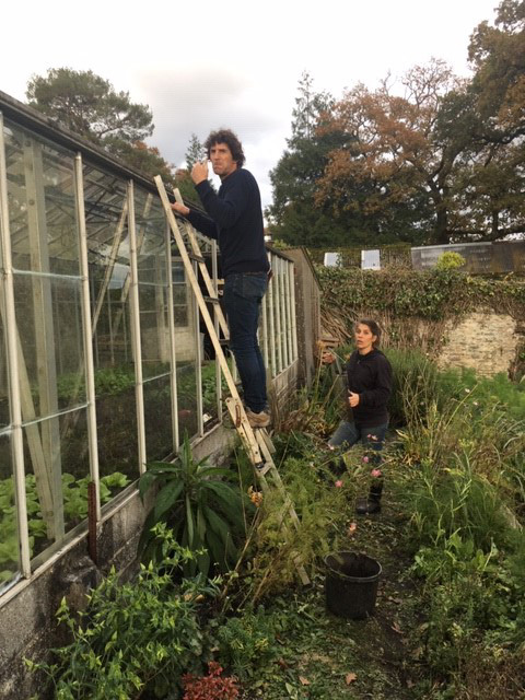 Olivier helps repair the Walled Garden greenhouse