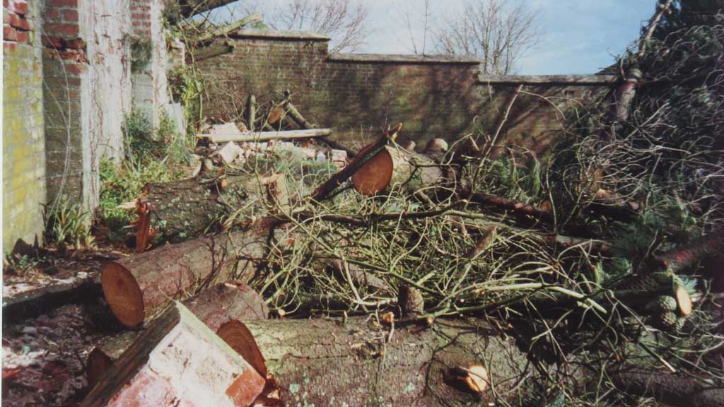 'before' and 'after' images of Mary's walled garden