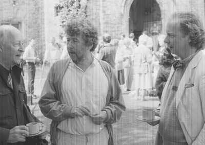 Birtwistle (centre) with Witold Lutosławski (right) and Gavin Henderson (left) at Dartington. Photo by Charles Davis