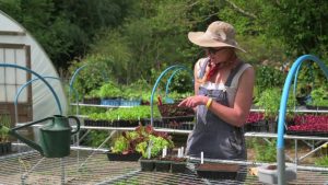 Amy outside the potting shed at Schumacher College