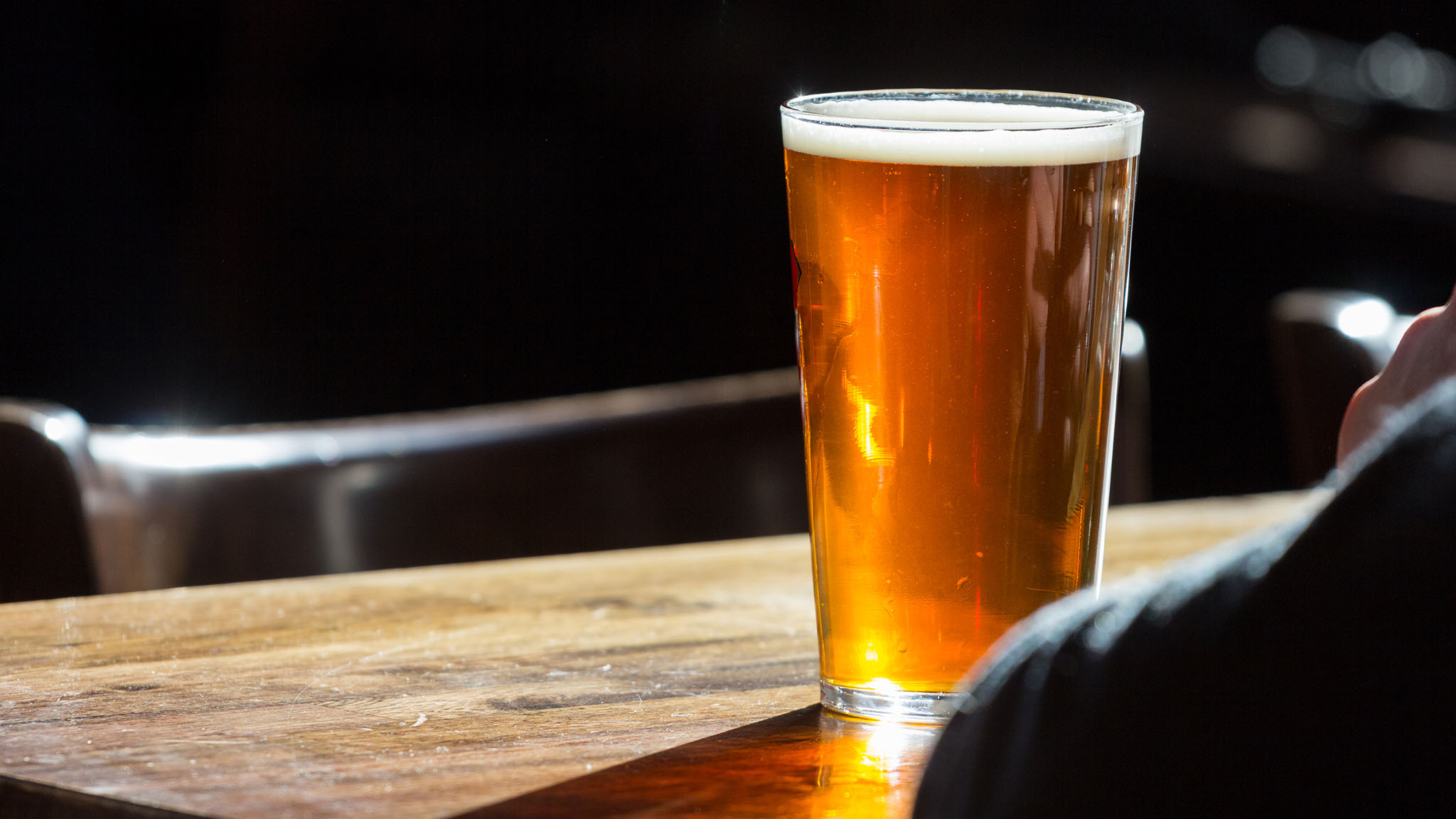 An english ale on a wooden table An english ale on a wooden table